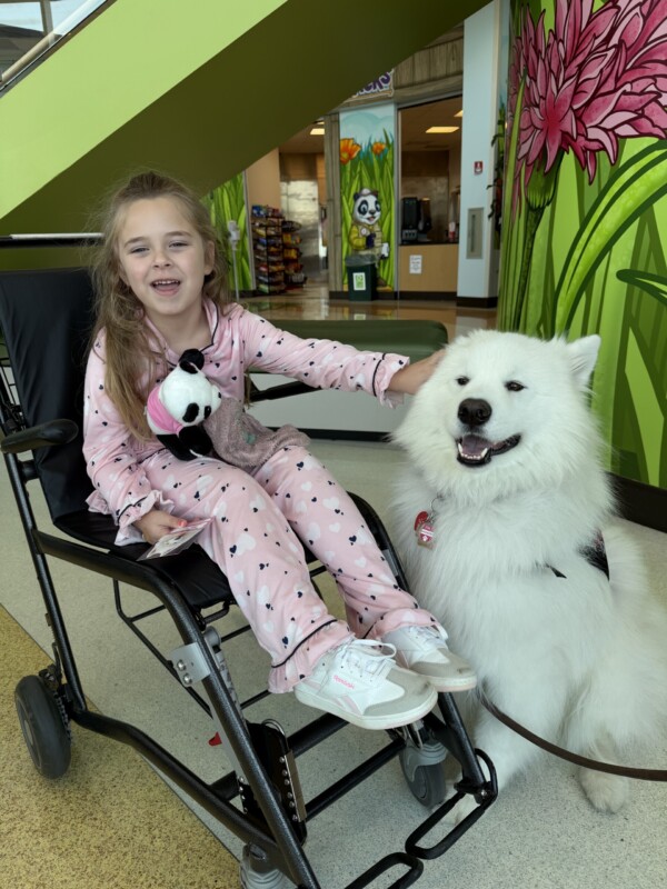 Saint Francis patient Scarlett with Skye.