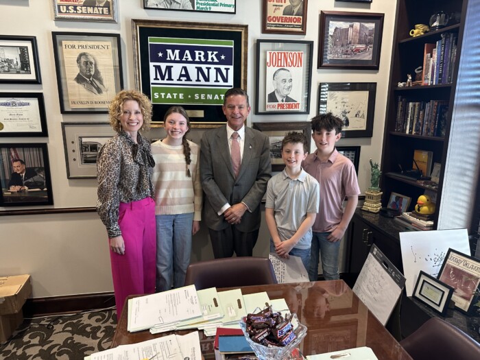 the Paige family visits Sen. Mark Mann at the Oklahoma State Capitol