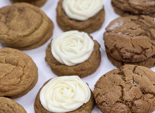 a tray of pumpkin cookies and molasses cookies