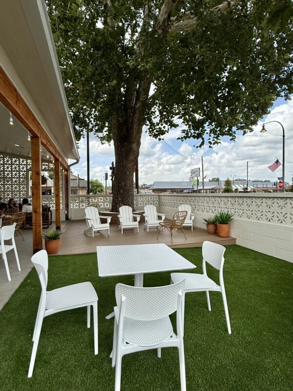 fenced patio with seating at Laurannae Jenks, one of our kid-friendly coffee shops